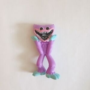 Colorful Monster Action Figure with Pink and Blue Accents